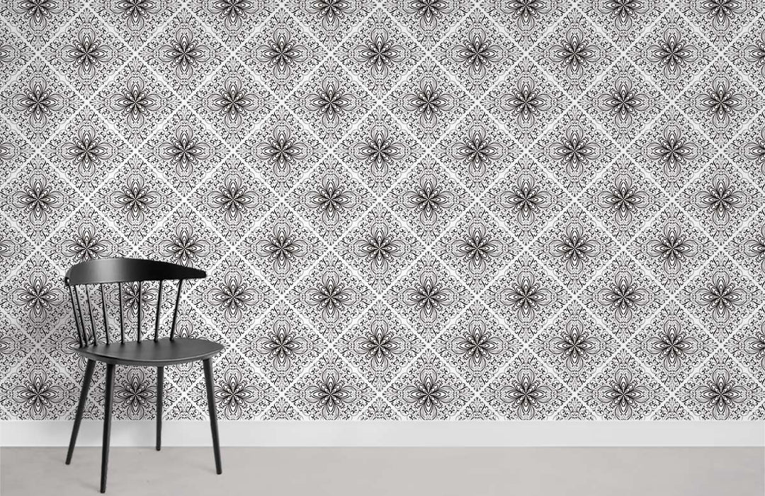 Vintage Victorian floral damask wallpaper in black and white, featuring elegant chair on grey flooring.