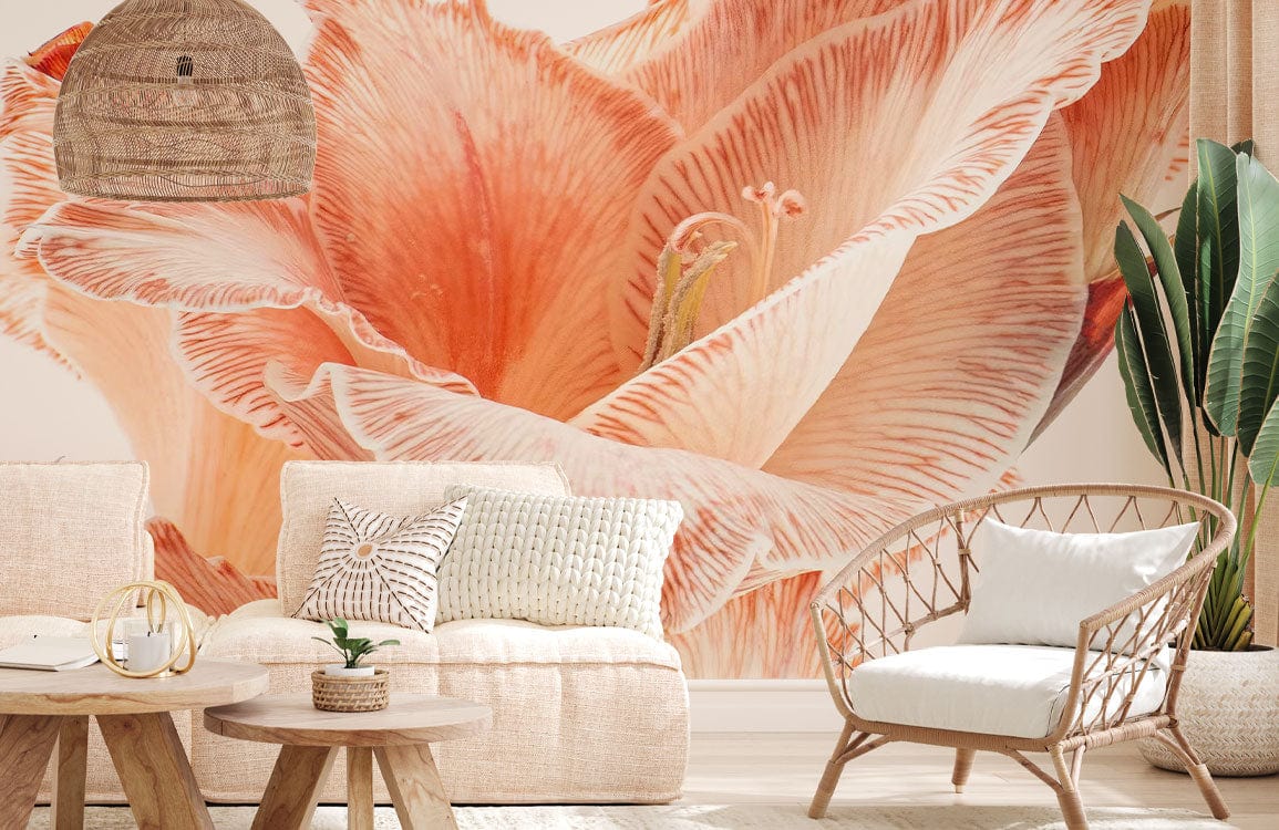 Elegant Peach Floral Bloom Wallpaper in lounge setting with wicker chair, beige sofa, and pendant light.