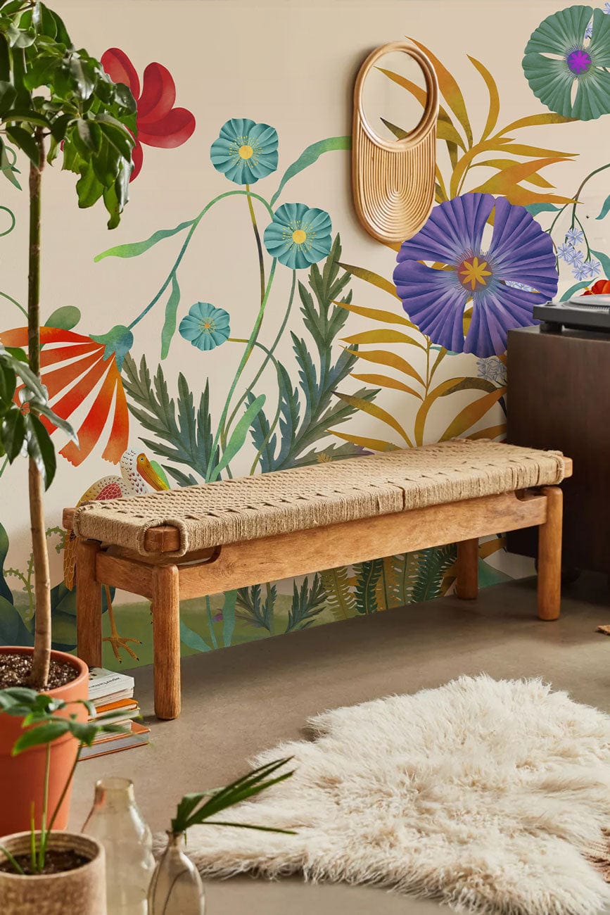 Botanical Garden Delight floral wallpaper; vintage style, rattan bench, shaggy rug, earthy living room decor.