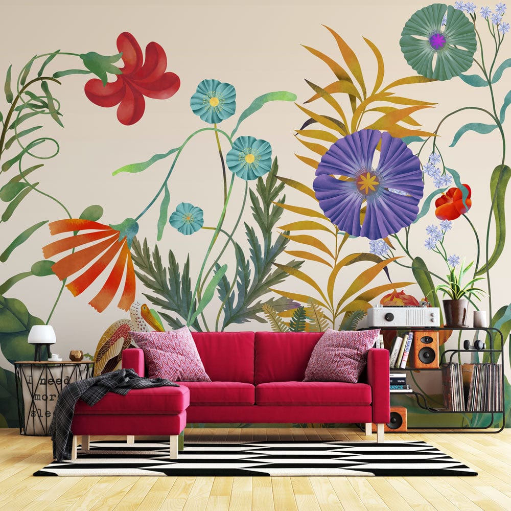 Vintage floral wallpaper in earthy tones with red sofa, striped rug, wooden floor, and colourful decor.