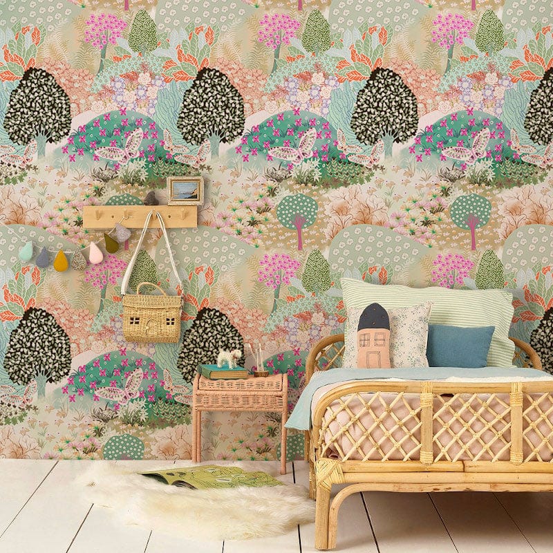 Pastel Dreamscape Garden Floral Wallpaper with wicker sofa, neutral flooring, and playful nursery Décor.