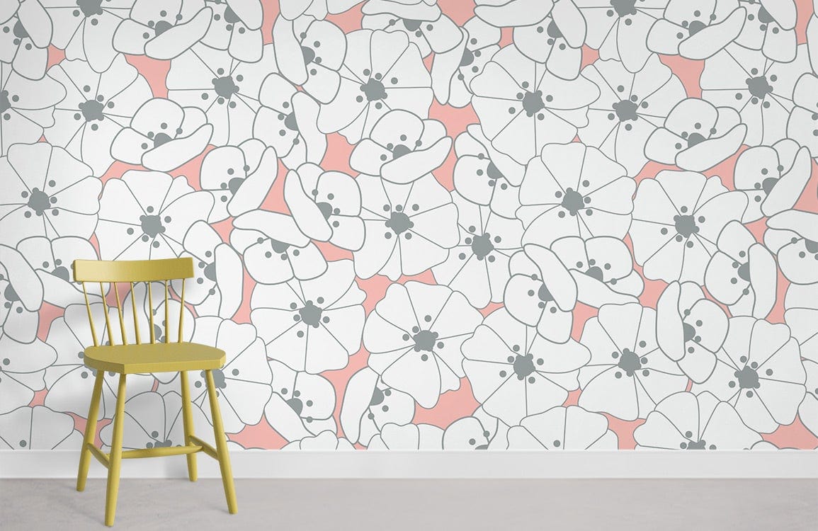Contemporary floral wallpaper featuring soft coral and white, with a wooden chair on grey flooring.