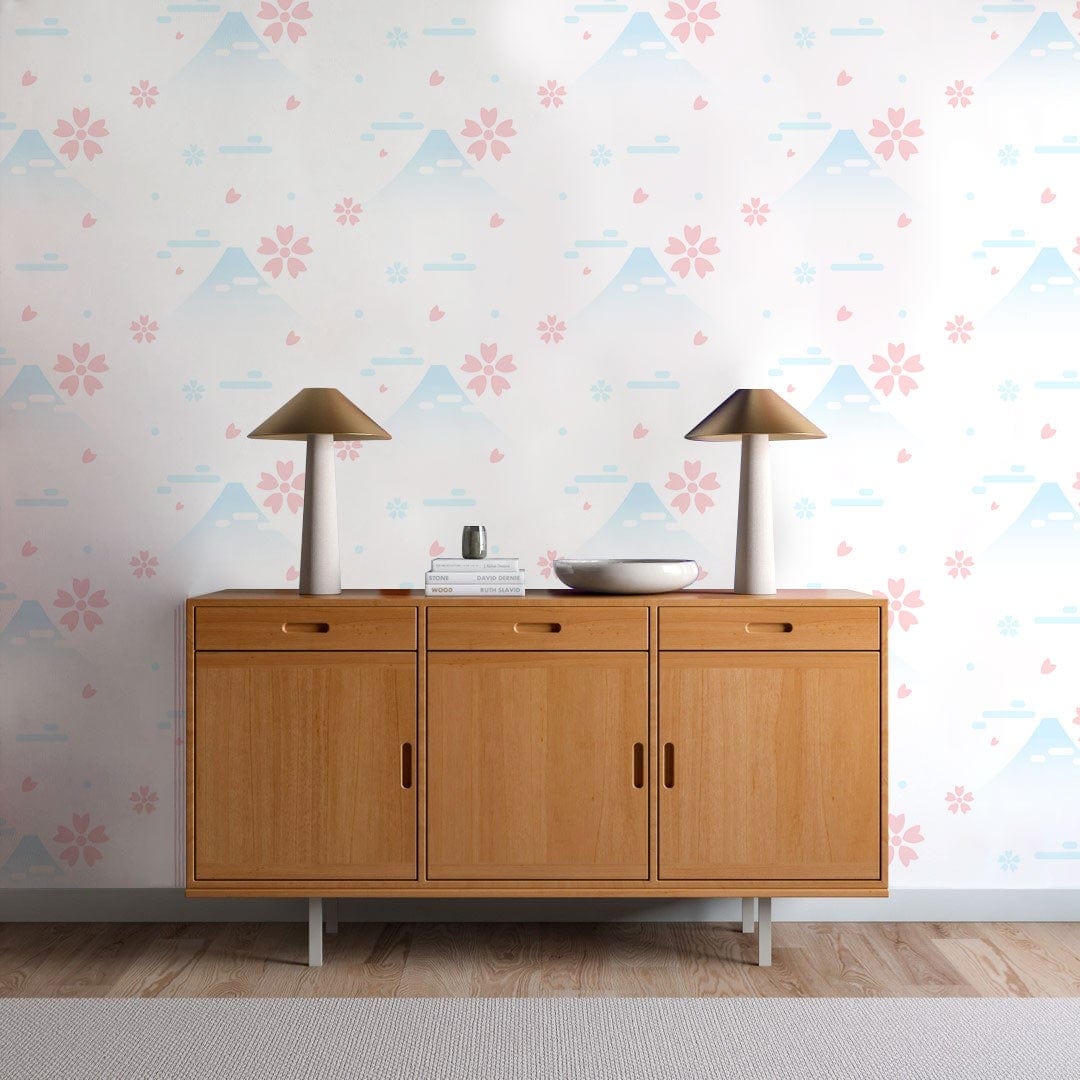 Tranquil Pastel Mountain Cherry Blossom Mural Wallpaper with wooden sideboard, table lamps, neutral rug.
