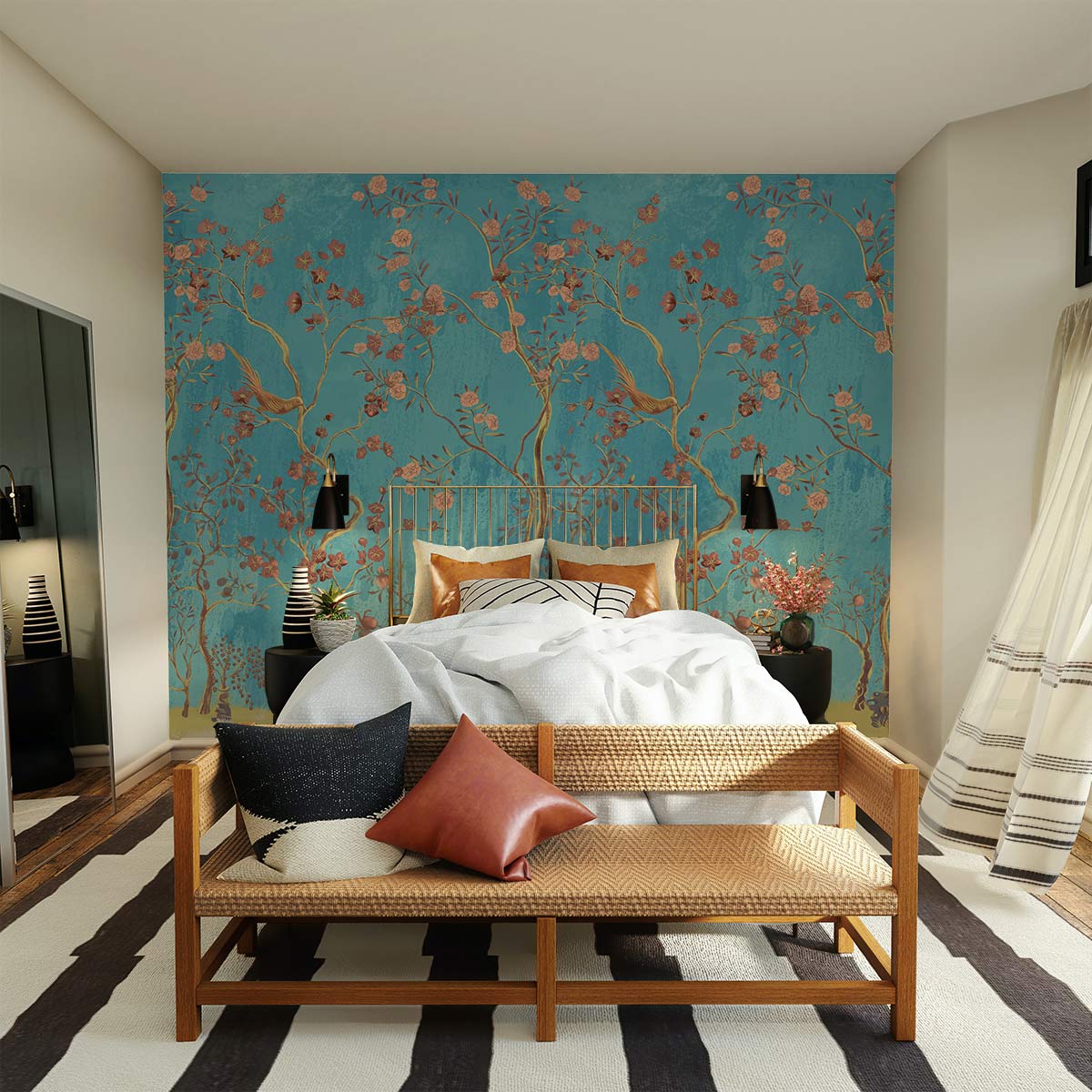 Elegant teal Chinoiserie wallpaper; golden birds motif in sophisticated bedroom; striped rug; wicker seat.