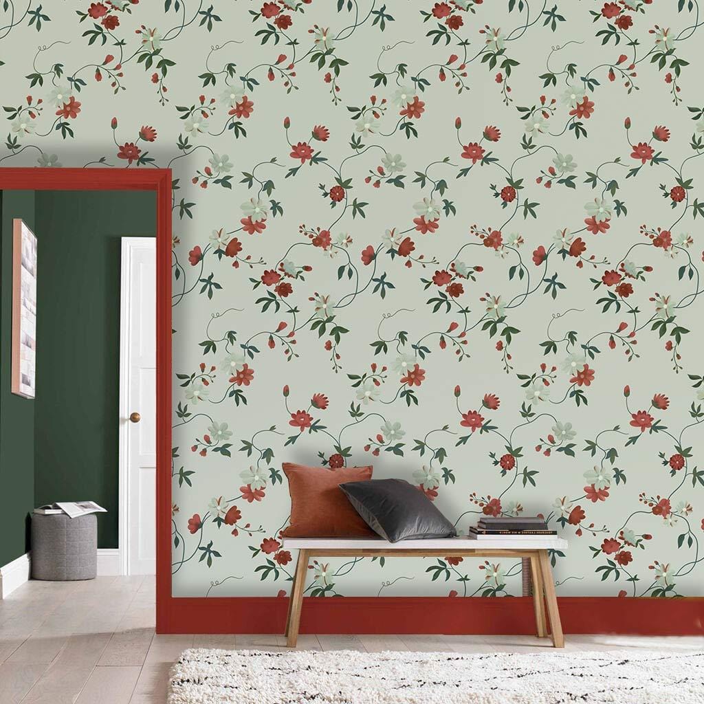 Cherry Blossom Elegance Vintage Floral Green Wallpaper in living room, wooden bench, dark green walls.