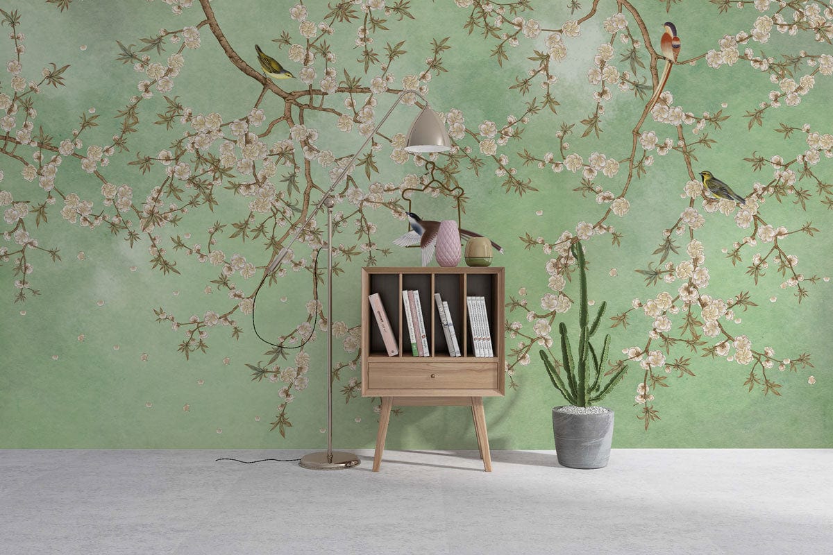 Serene Green Blossom Birds Mural Wallpaper with cabinet, tall lamp, minimalist decor in modern room.