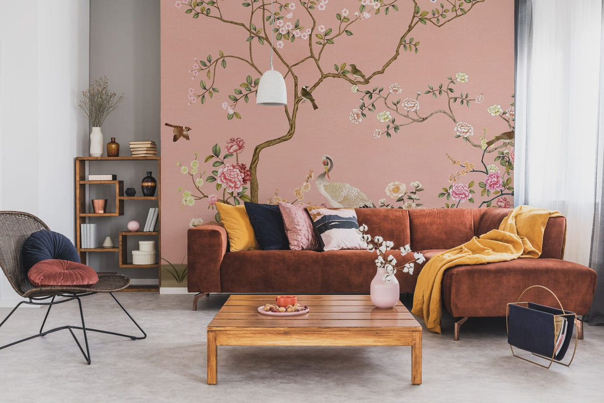 Elegant Pastel Chinoiserie Mural Wallpaper with Cranes in living room, brown sofa, light wood table.