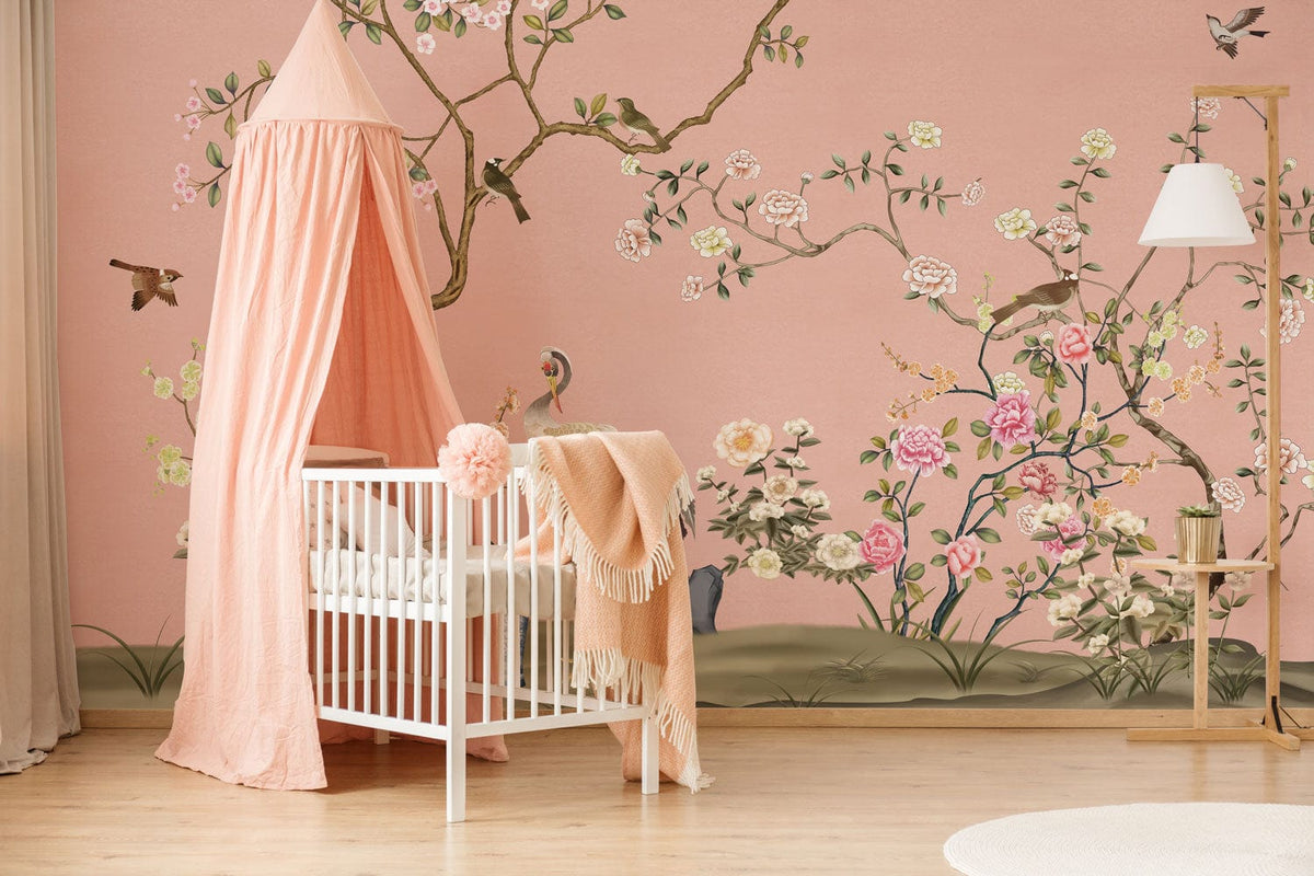 Nursery with pastel Chinoiserie mural, white crib, pink canopy, wood flooring, and floor lamp.