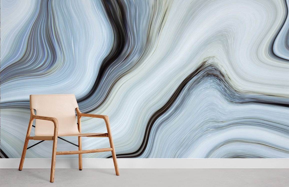 Marble-inspired blue-grey swirl mural wallpaper with beige wooden chair on grey flooring in minimal room.