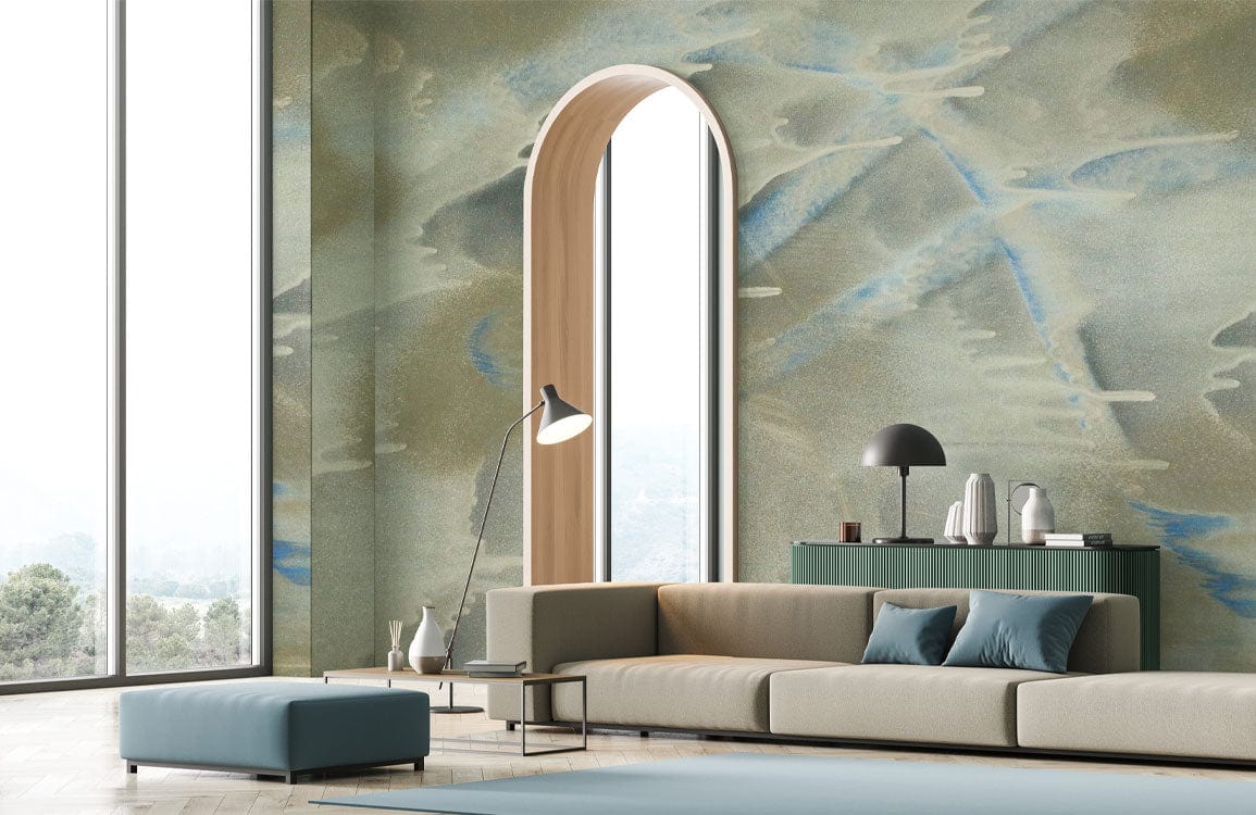 Elegant blue-grey abstract mural wallpaper in spacious lounge with modern beige sofa and arched window.