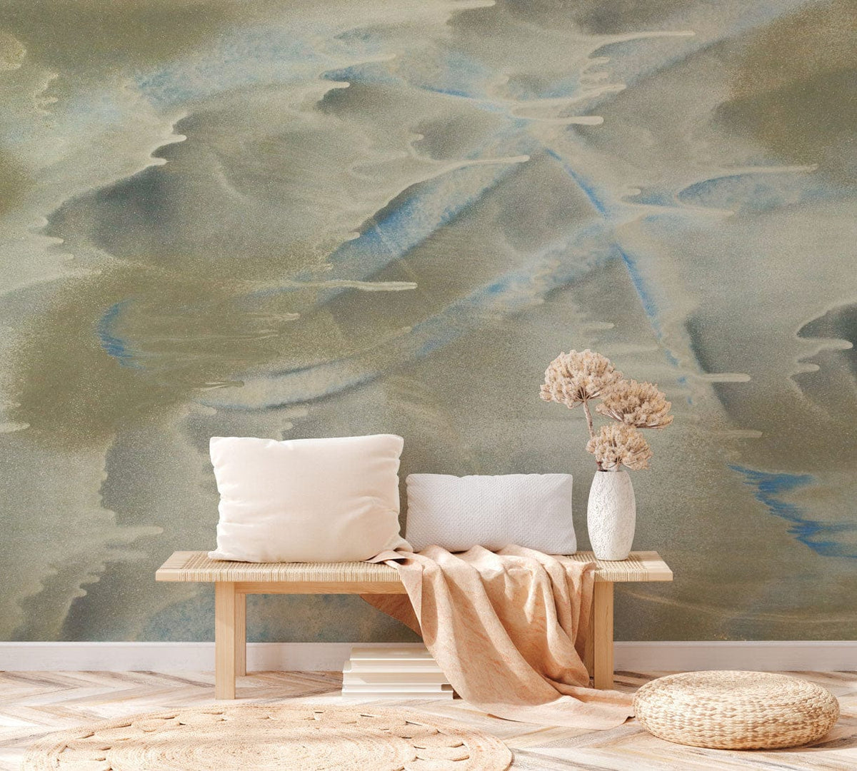 Elegant watercolour mural wallpaper; serene room with wooden bench, cushions, beige rug and natural decor.