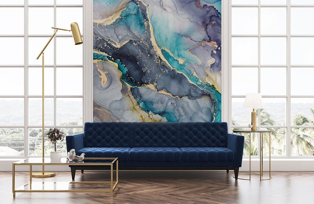 Luxurious blue and gold marble mural, blue sofa, herringbone wood flooring, gold accents, modern living room.