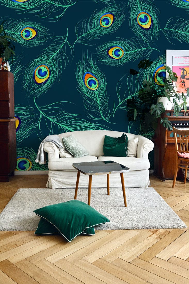 Vibrant peacock feather wallpaper, teal multicolour; white sofa, green cushions, wooden flooring, cosy lounge.
