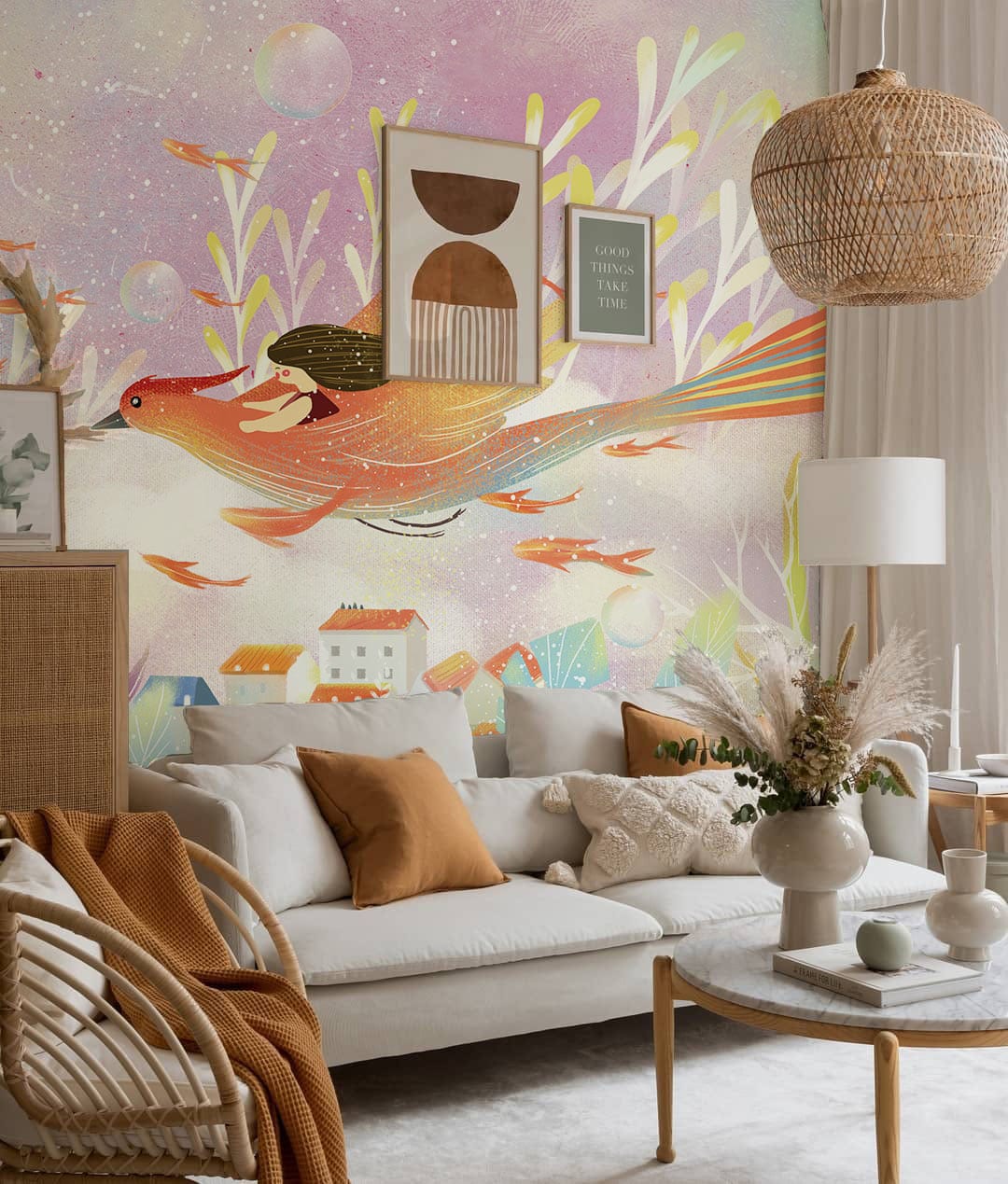 Whimsical Pastel Fantasy Mural Wallpaper in living room with cream sofa, rattan pendant light, light flooring.