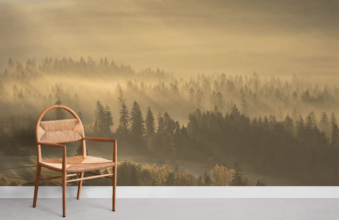 Golden Misty Forest Landscape Mural Wallpaper, natural wood chair, grey flooring, serene room design.