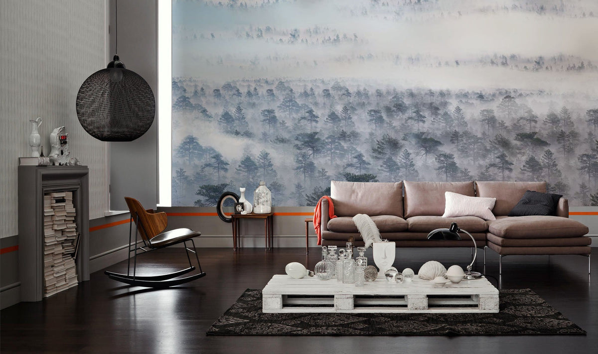 Serene Misty Forest Mural Wallpaper in living room with brown sofa, dark wood flooring, modern decor.