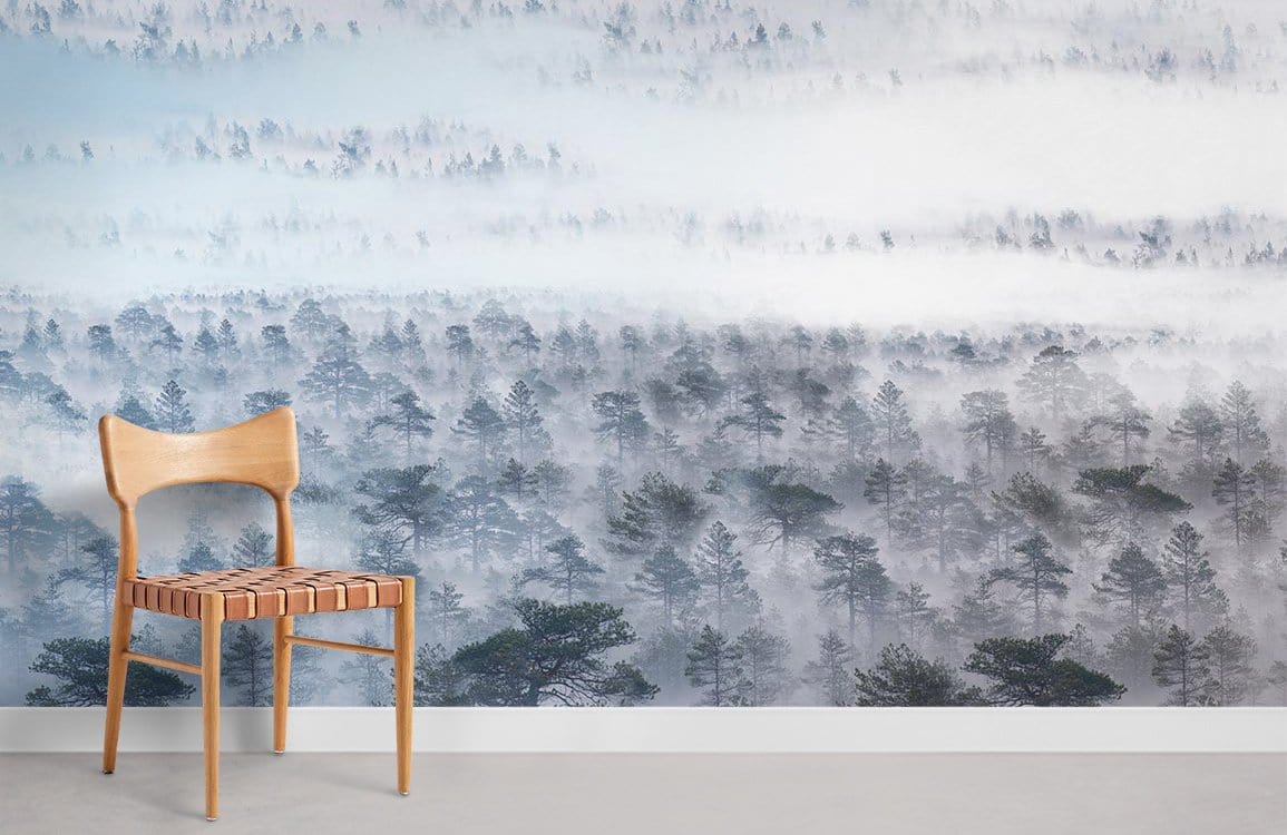 Serene Misty Forest Landscape Mural Wallpaper with wooden chair on grey flooring in minimalist room.