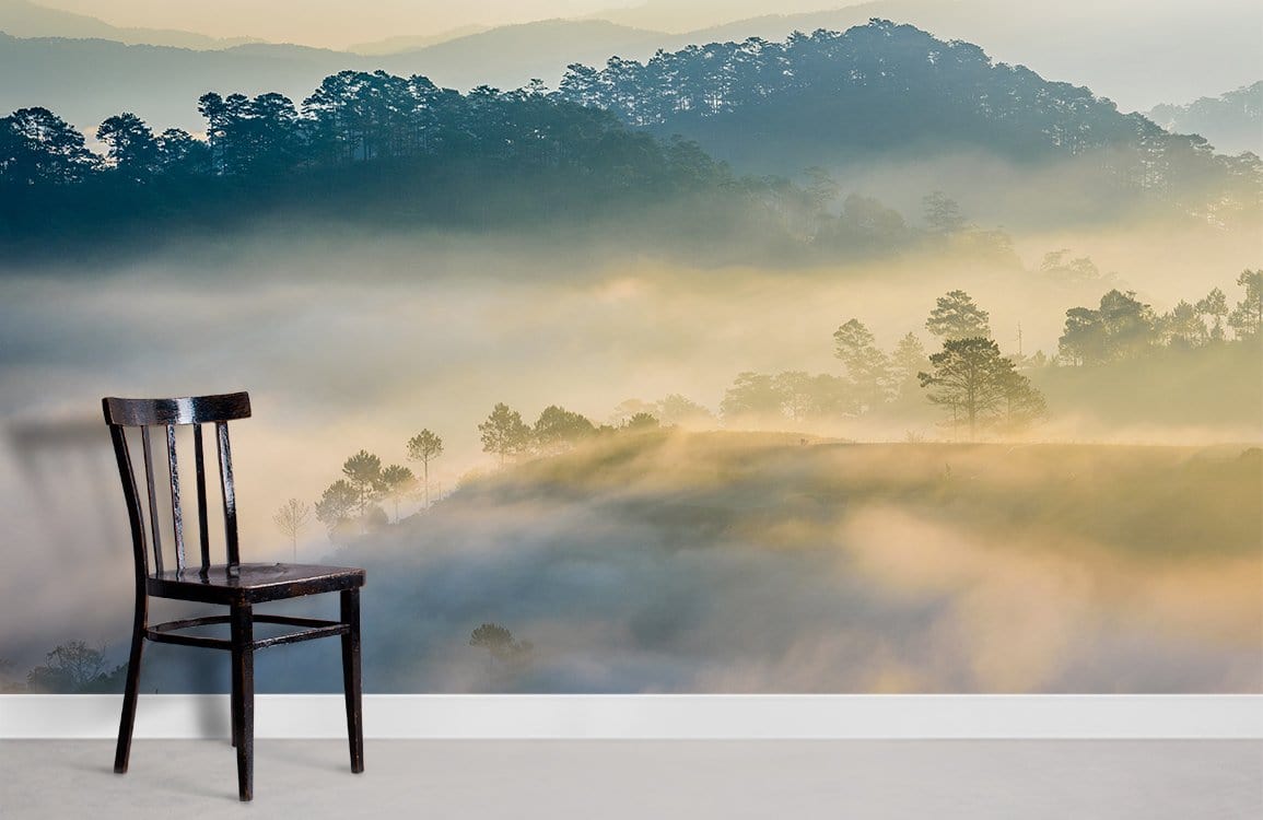 Mystical Foggy Forest Mural Wallpaper with wooden chair on grey floor in serene room setting.