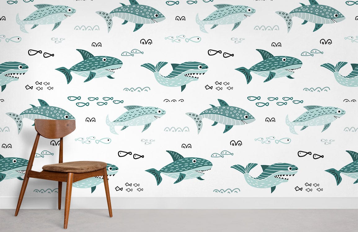 Whimsical teal sea creature wallpaper with wooden chair, coastal theme, grey flooring, children's room decor.