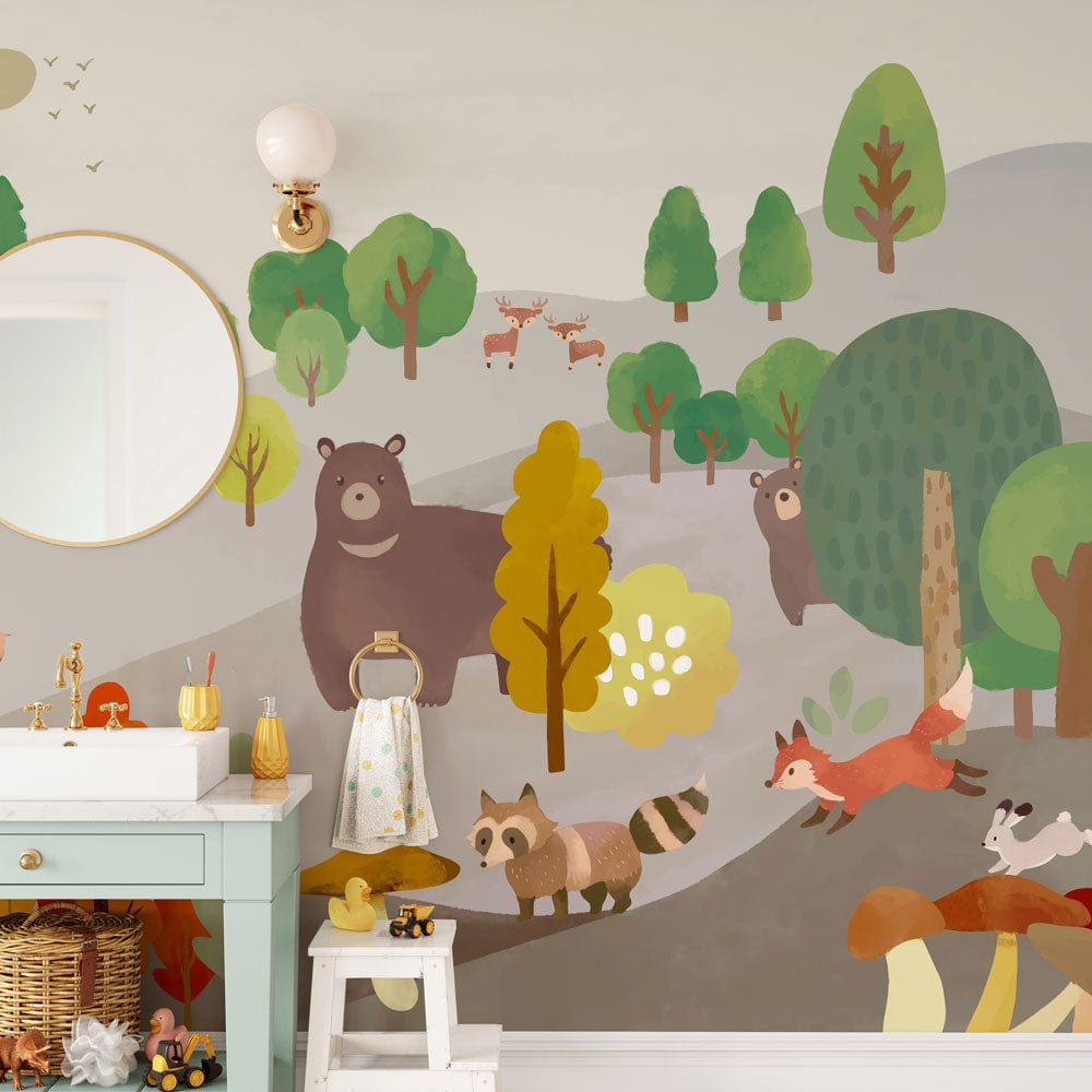 Woodland animals mural wallpaper in children's room with green cabinet and playful decor elements.