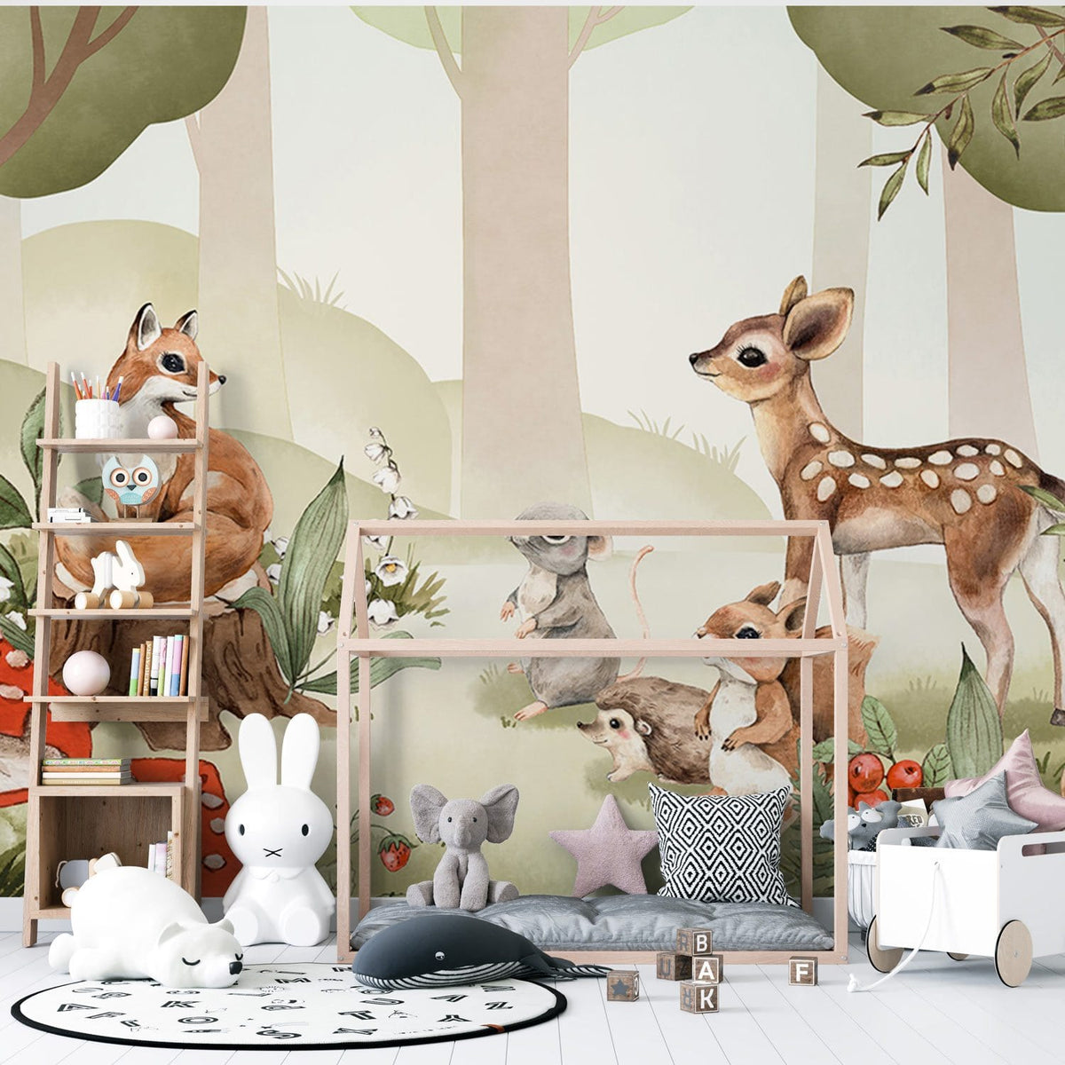 Enchanting Woodland Creatures Wall Mural in nursery with toys, pastel decor, and light wood flooring.