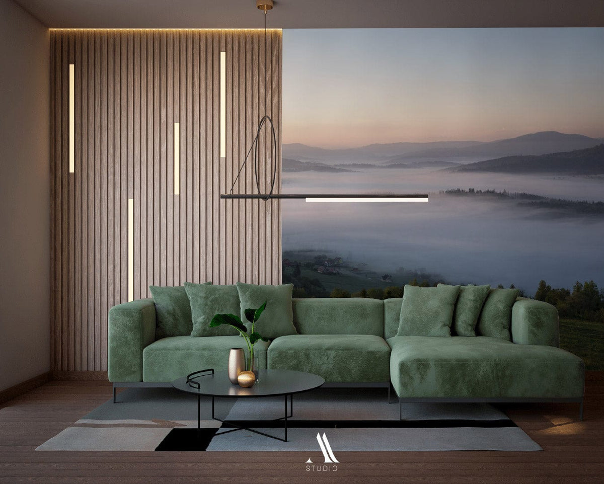 Tranquil misty morning landscape wallpaper, green velvet sofa, wooden flooring, modern lighting, stylish living room.