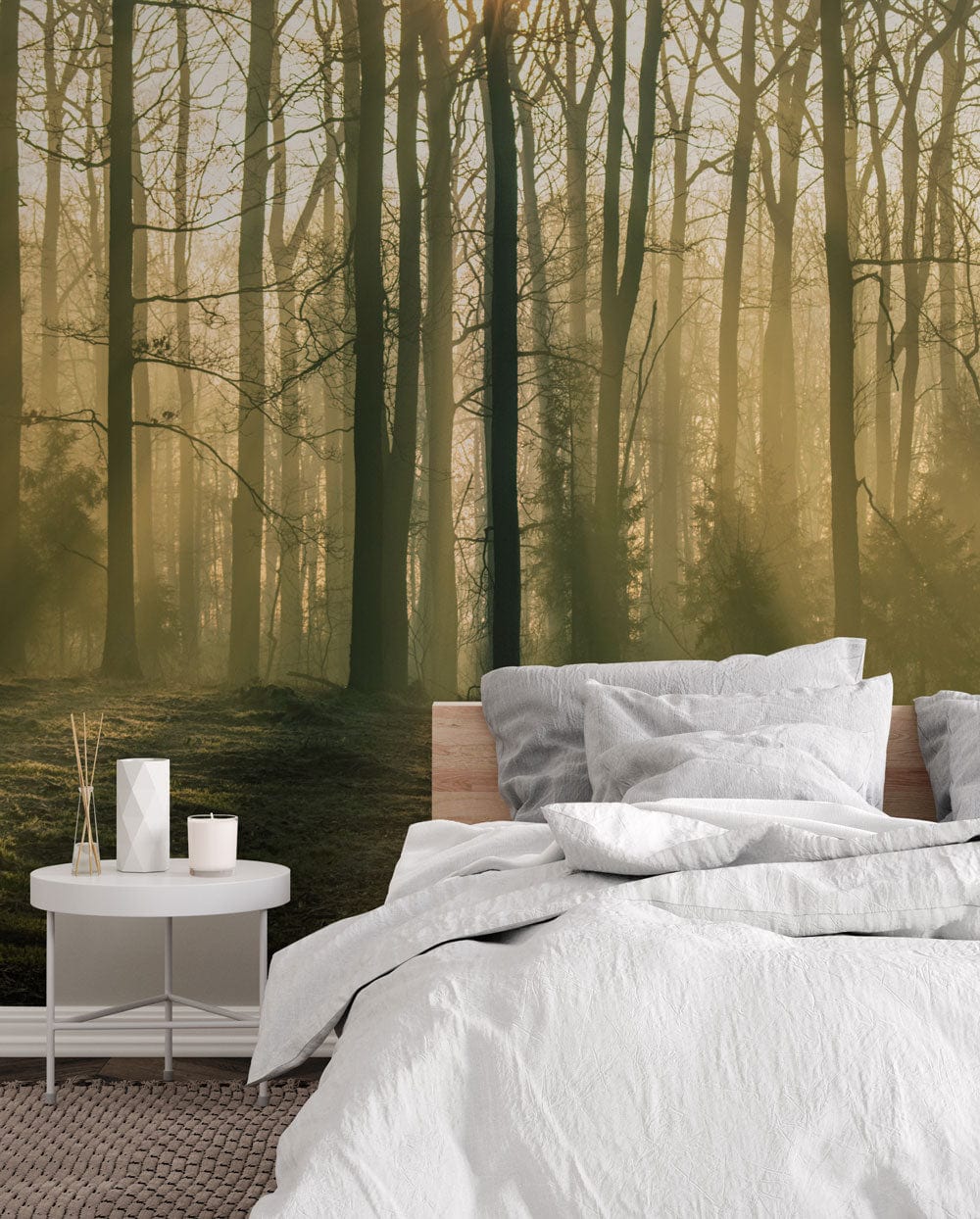 Enchanted Forest Sunrise Mural Wallpaper in green bedroom with modern bed, neutral bedding, woven rug.