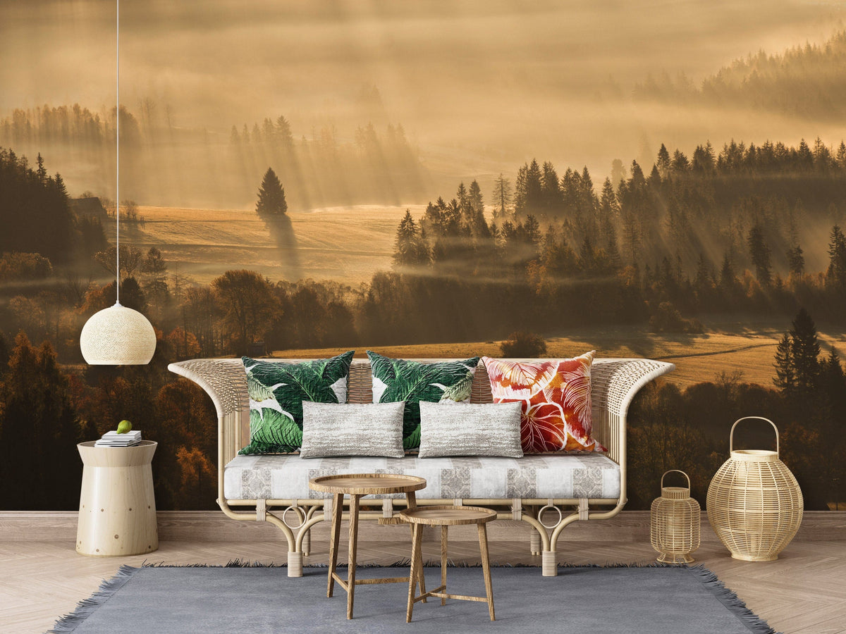 Rattan sofa, grey cushions, autumn mural wallpaper, pendant lamp, light wood floor, tranquil living room.