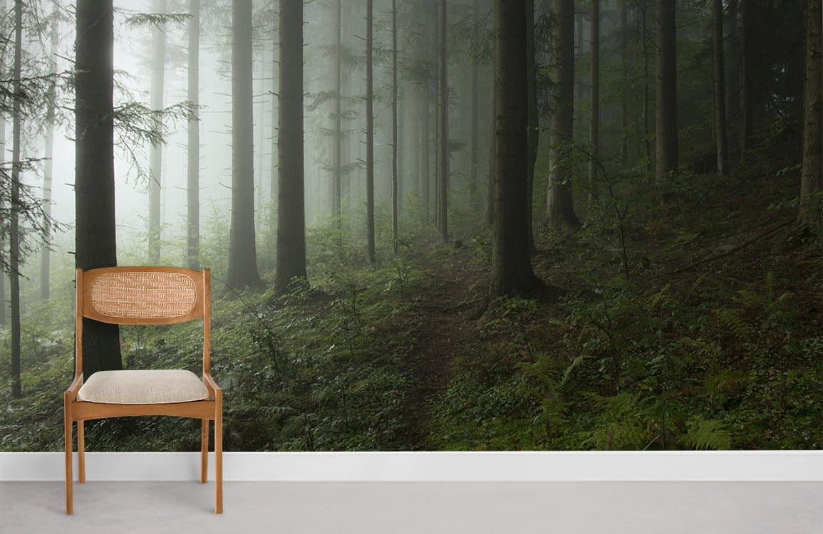 Misty Forest Green Nature Mural Wallpaper with wooden chair on grey flooring in serene interior setting.