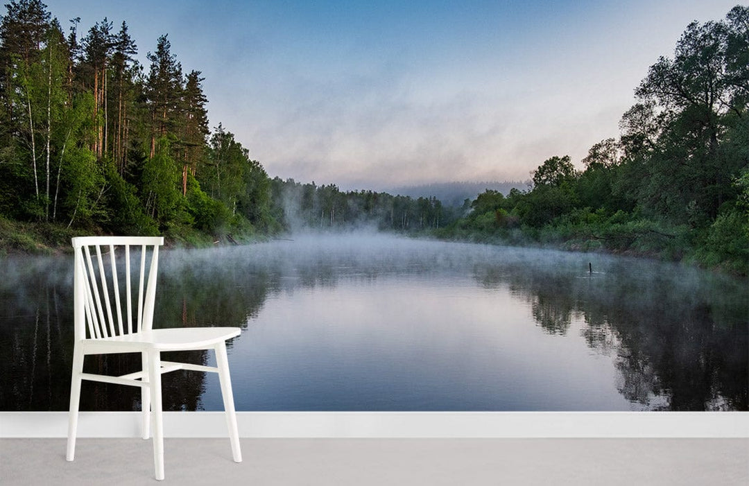 White chair on grey floor with Serene Misty River Forest Landscape Mural Wallpaper, nature wall art.