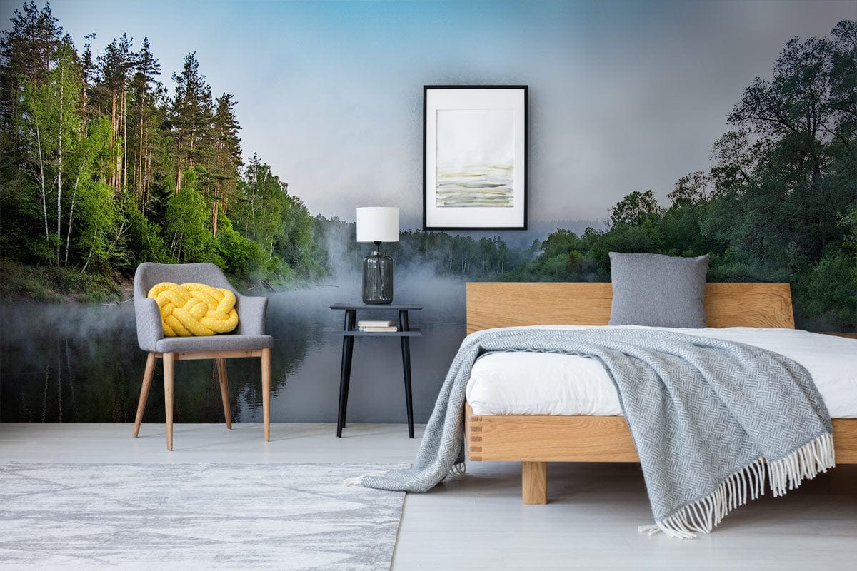 Modern bedroom with Serene Misty River wallpaper, grey chair, wooden bed, light rug, elegant decor.
