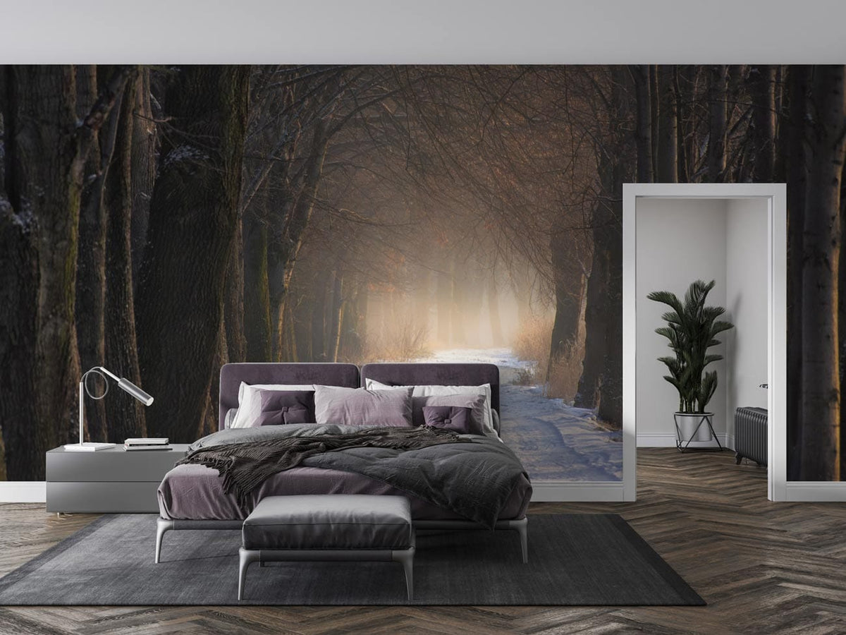 Enchanted Winter Woodland Path Mural in bedroom, grey bed, chevron flooring, white walls, potted plant.