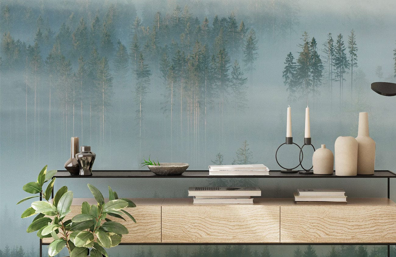 Tranquil Misty Forest Mural Wallpaper features serene forest design, modern console, light wood finish.