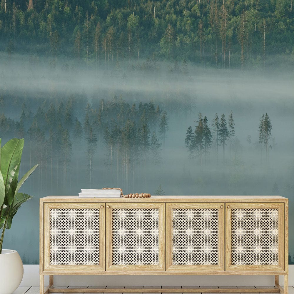 Tranquil Misty Forest Mural Wallpaper in serene room with wooden sideboard and parquet flooring.