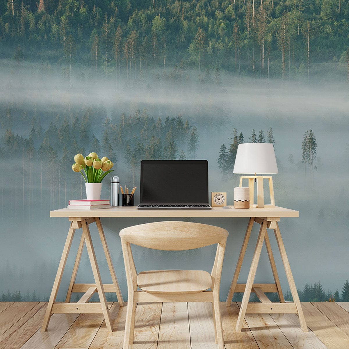 Misty forest wallpaper in serene room, wooden desk and chair, light wood flooring, calming design.