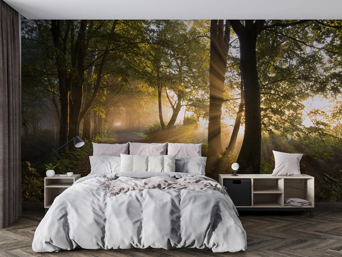 Golden Forest Sunlight Path Wallpaper in bedroom with grey bed, herringbone flooring, and sleek side tables.