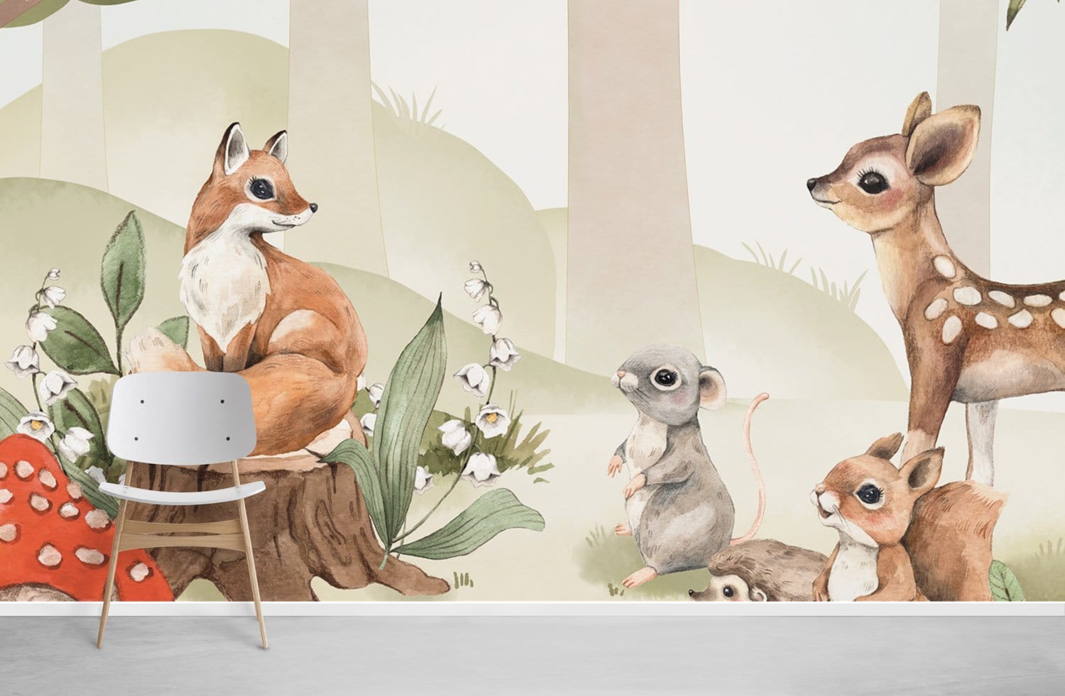 Enchanting Woodland Creatures Wall Mural with fox, deer, mushrooms; grey chair; white and grey decor.