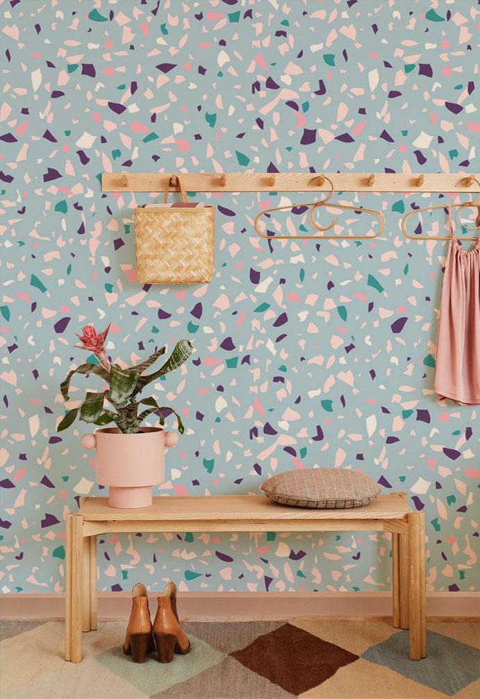 Elegant Blue Terrazzo Pattern Wallpaper in modern hall with wooden bench and geometric rug design.