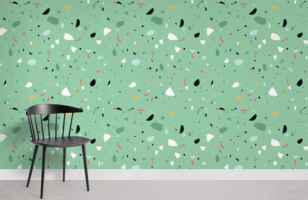 Speckled Terrazzo Mint Green Wallpaper with black chair, contemporary interior decor, living room setting.