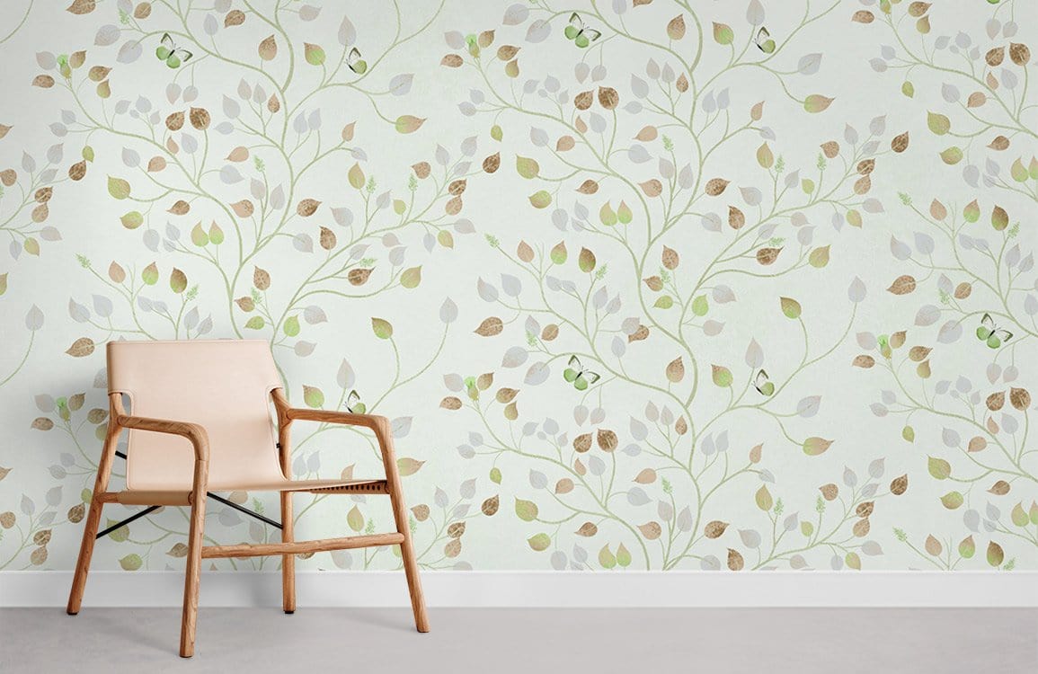 Elegant leafy wallpaper in soft green with armchair; modern design; light grey flooring.