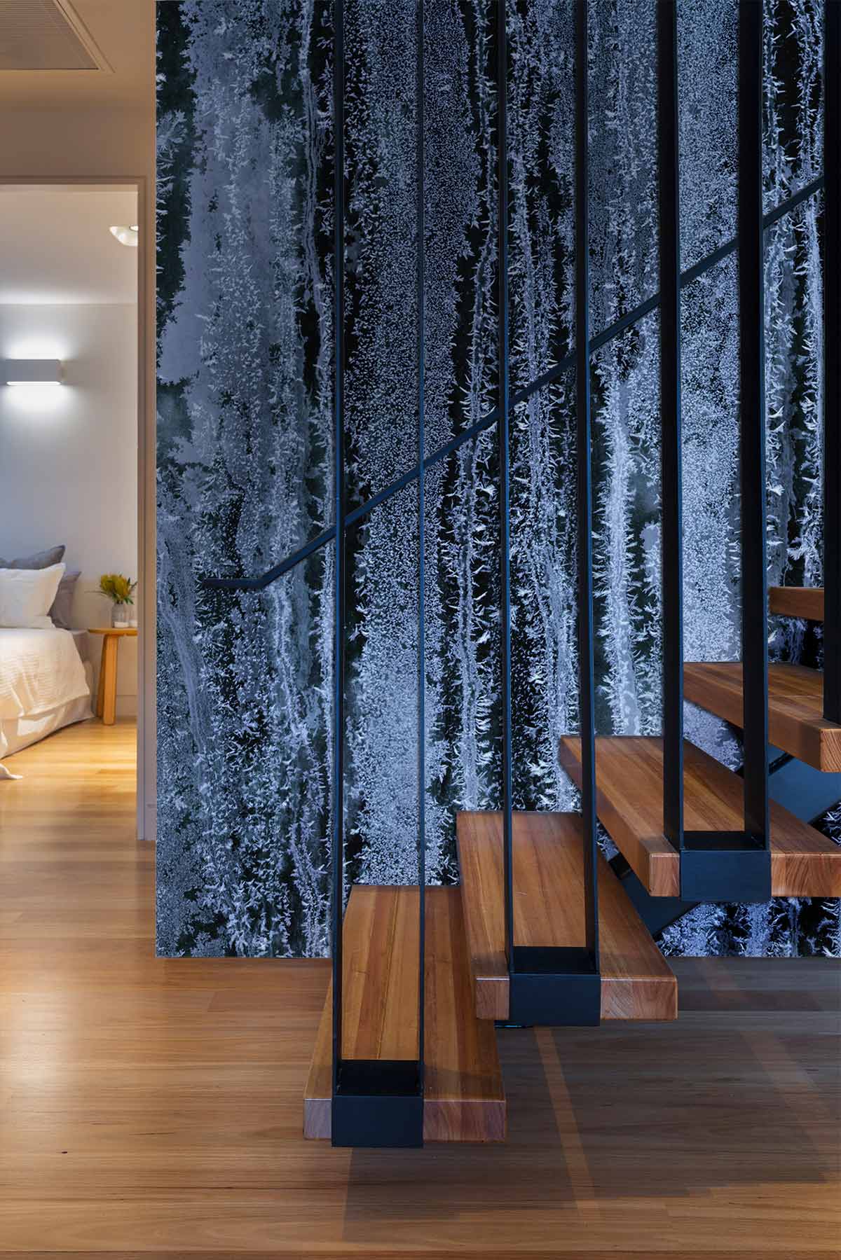 Icy Blue Vertical Texture Wallpaper, modern staircase, wooden flooring, bedroom in background, elegant decor.