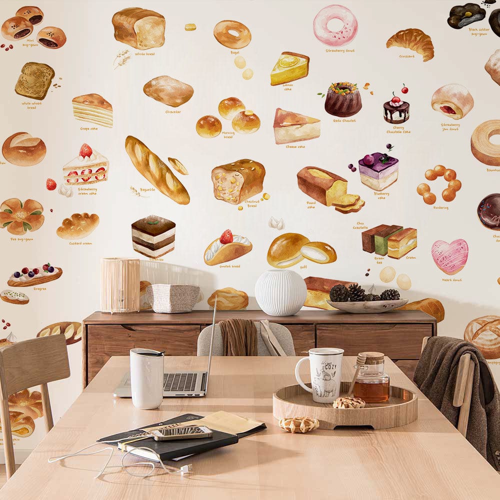 Artisan Bakery Treats wallpaper in cosy kitchen; wooden table, chairs, and neutral decor accents.