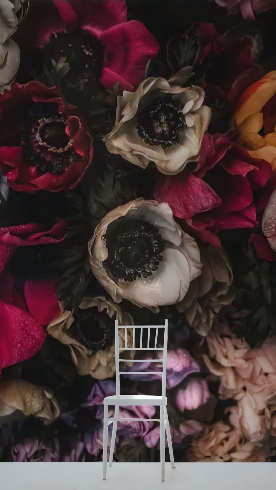 Elegant Dark Floral Blooms Wallpaper features rich botanical design with white chair.