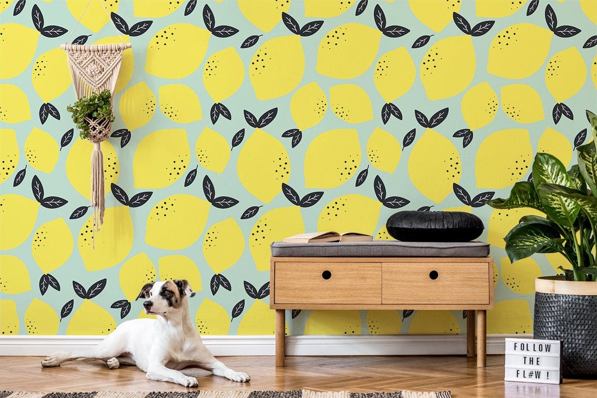 Retro Lemon Bliss Wallpaper in vibrant yellow and mint green, with wooden console, dog, and wall art.