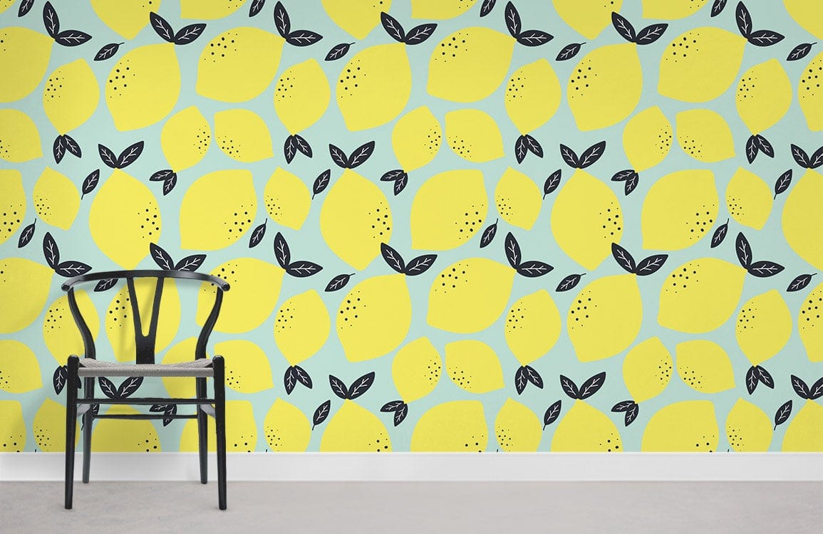 Retro Lemon Bliss Wallpaper in yellow, mint green pattern with black chair, light grey flooring.