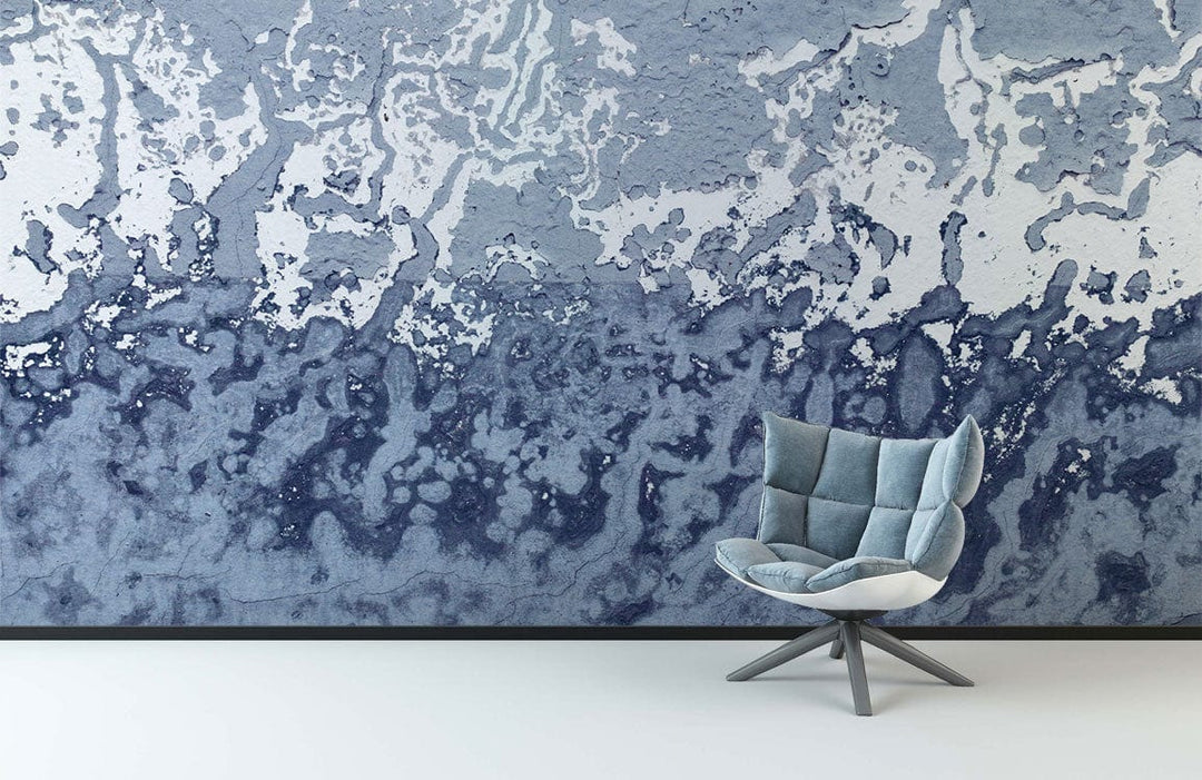 Abstract Oceanic Wash Watercolour Mural in cool grey, featuring plush blue chair on white flooring.
