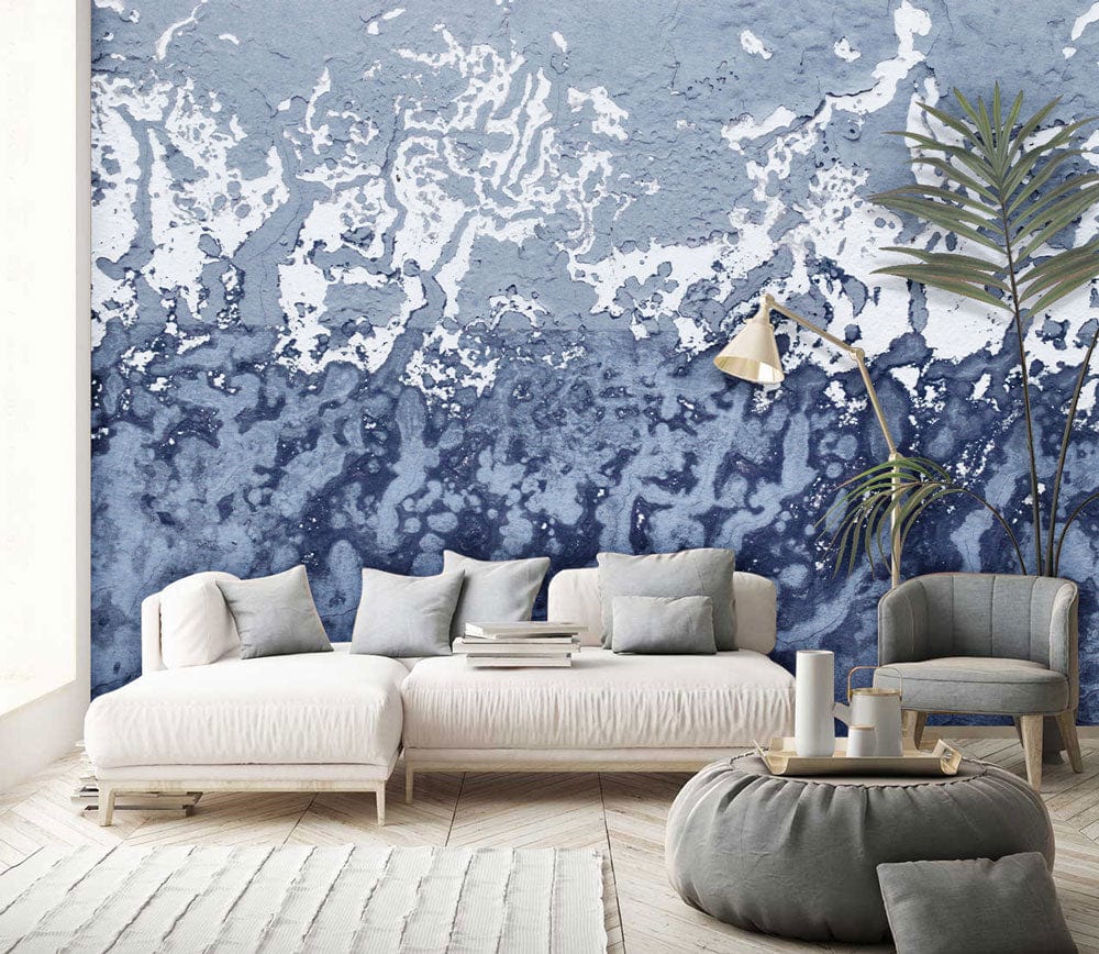 Abstract Oceanic Wallpaper accentuates modern living room; chic grey sofa, cosy armchair, parquet flooring.