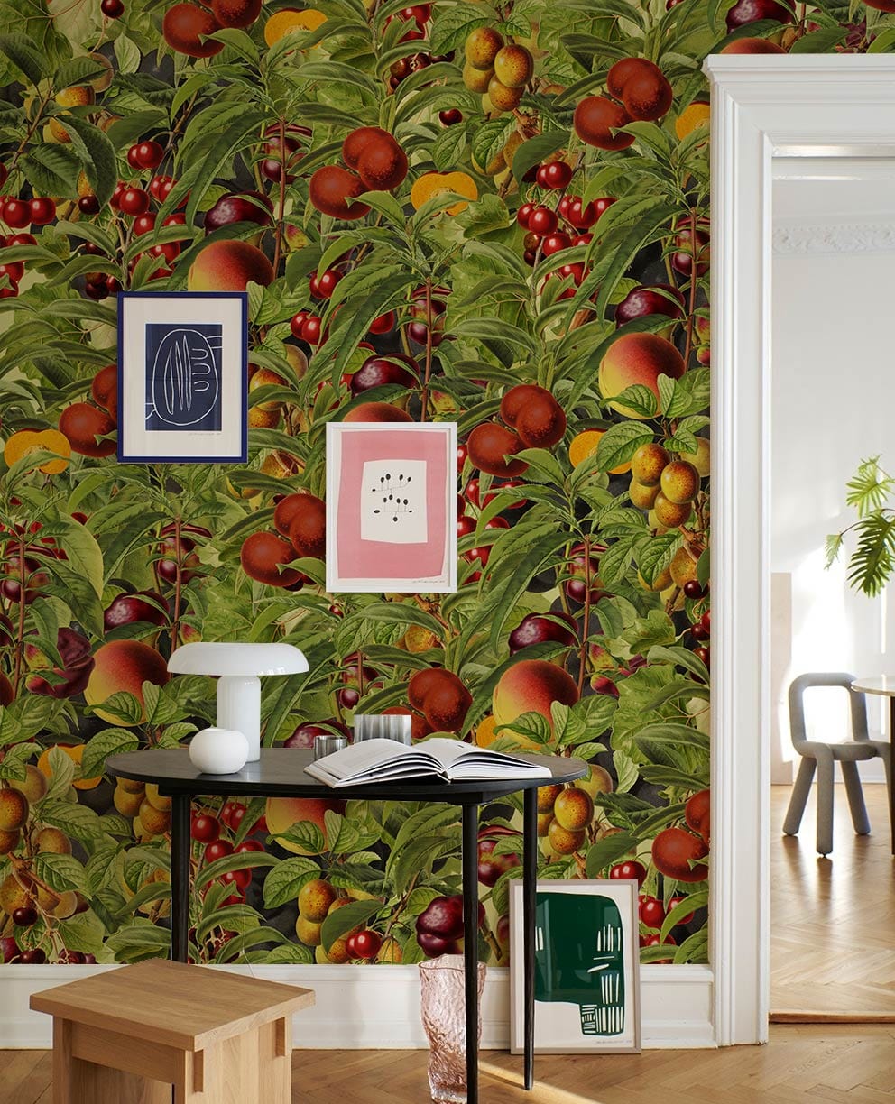 Vibrant Orchard Delight Fruit Wallpaper with black table, modern art, and wooden flooring in living room.