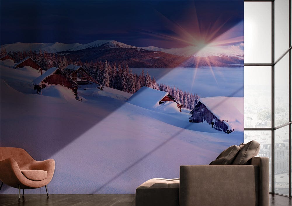 Sunset Alpine Winter Scene Mural in purple, with grey sofa, brown chair on hardwood flooring.