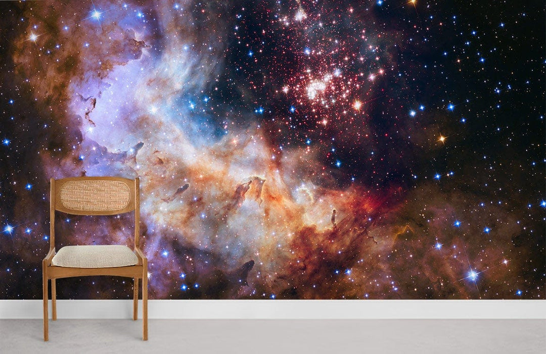 Ethereal cosmic starscape mural wallpaper in blue, purple hues, mid-century chair, minimalist room design.